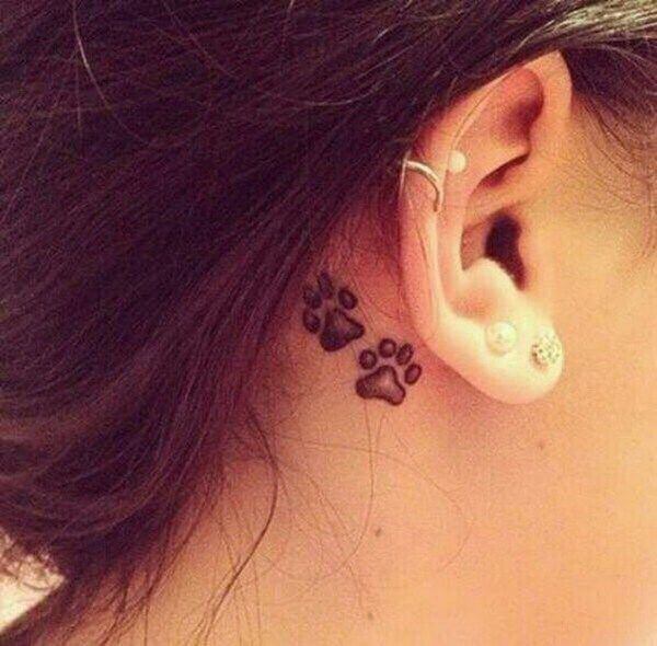 Paw Tattoo on Backside of the Ear: Paw Print Tattoo